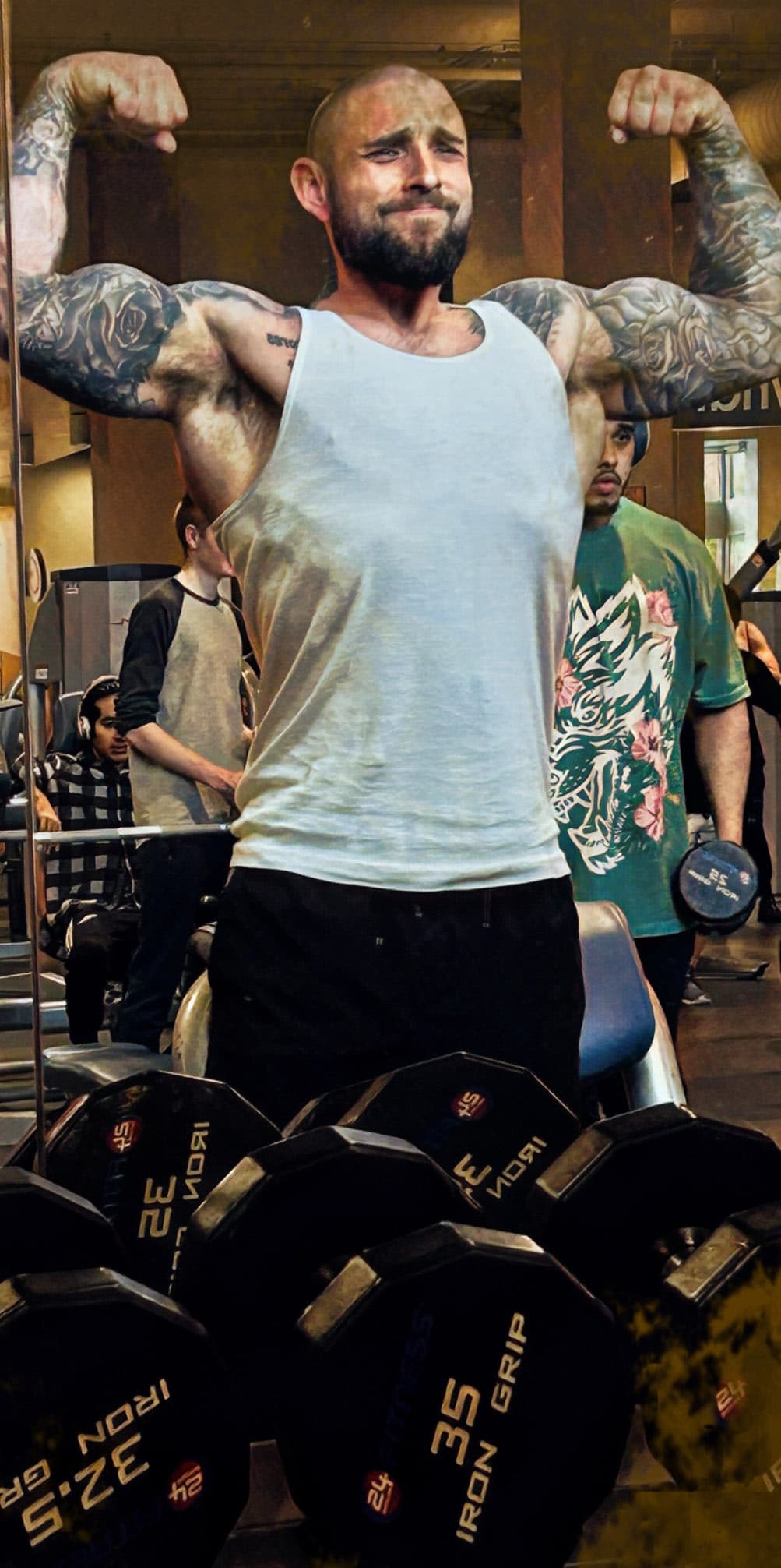 Barnaby in the gym, double biceps flex
